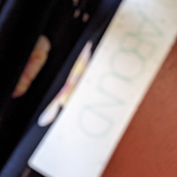 Ruffle bottom elastic waist skirt with pink floral pattern on black. Size large. - Picture 4 of 7